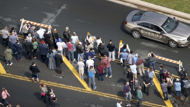 Media and fans gathered outside of Paisley Park Studios in Chanhassen, Minneapolis after news broke of Prince's death.