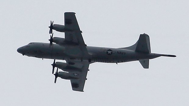 A US P3 Orion surveillance plane flying over Marawi, in the Philippines, earlier this month. Australia is expected to soon send P3 Orions to join the fight.