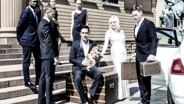 Putting on the Ritz: Karim Gharbi - seated holding dog - promoting The VIP Sydney sevice with client Christa Billich. 