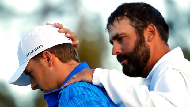 Mental collapse: Jordan Spieth (left) and caddie Michael Greller after the final round of the US Masters.