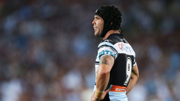 Ennis the menace: The Cronulla hooker goes out a winner in his last NRL game.