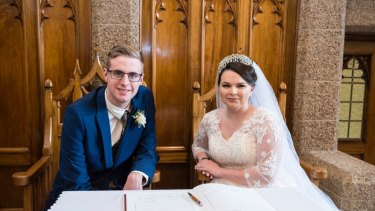 Lisa Sandford and Justin Beulah on their wedding day in February 2019. The couple say they have left the white supremacy movement and urge others to do the same.  