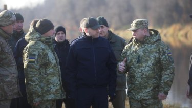 Ukrainian President Volodymyr Zelenskiy visiting troops. â€œI hope now the whole world clearly sees who really wants peace and who is concentrating almost 100,000 troops on our borderâ€.