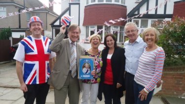 Conservative MP Sir David Amess, second from left, in his constituency. 