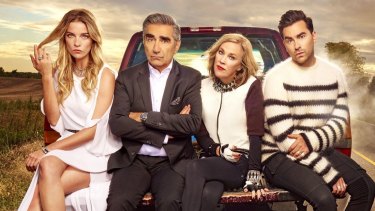 Annie Murphy as Alexis, Eugene Levy as Johnny, Catherine O'Hara as Moira and Daniel Levy as David in Schitt's Creek.