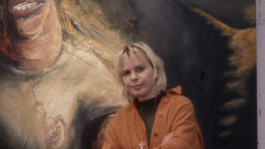 Karen Casey poses with her work Got the Bastard, 1991.