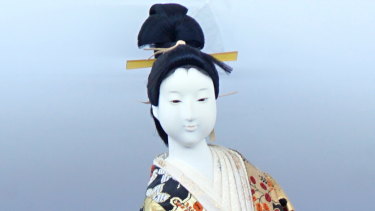 A Japanese figurine is one of the many Asian-influenced home decorations on sale from the Bjelke-Petersen estate.