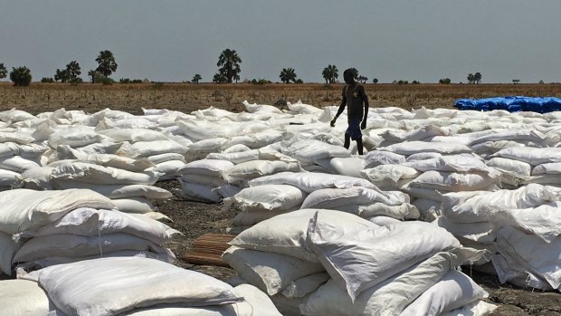 Bags of food dropped by air from a World Food Programme plane are sorted in Padeah, South Sudan, in March.