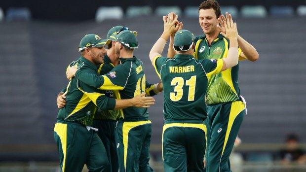 Josh Hazlewood celebrates after taking the wicket of England's Steven Finn in Perth. 