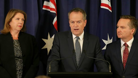 Opposition Leader Bill Shorten, flanked by opposition health spokeswomen Catherine King, and shadow treasurer Chris Bowen on Tuesday.