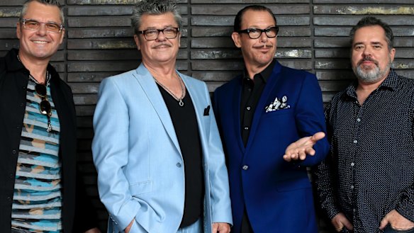 Kirk Pengilly with INXS band members.
