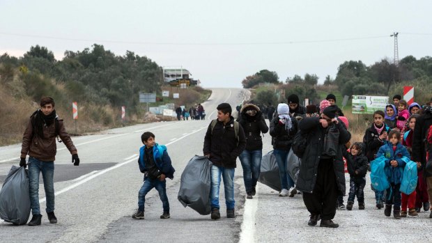 Migrants in Turkey en route to boats for Greece.