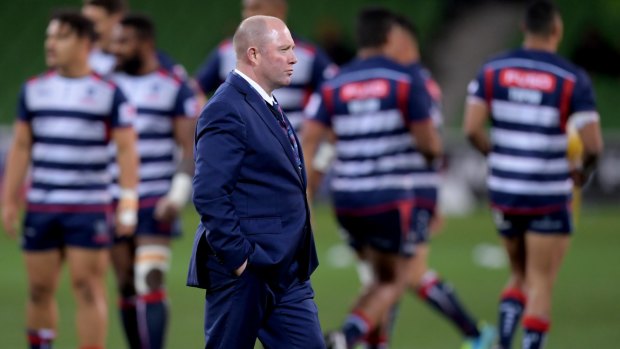 Outgoing coach Tony McGahan and the Rebels during their last game of the Super Rugby season.