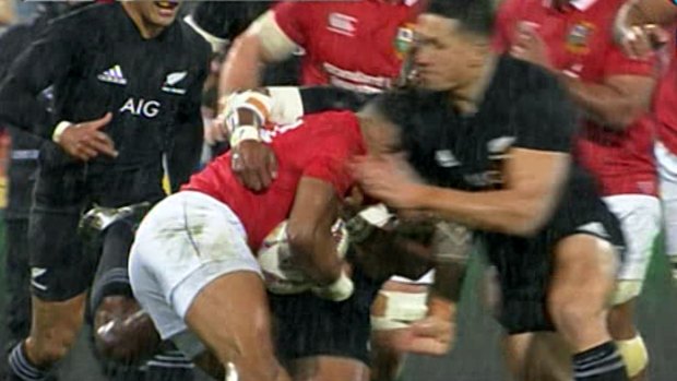 Sonny Bill Williams makes contact with the head of a Lions player.