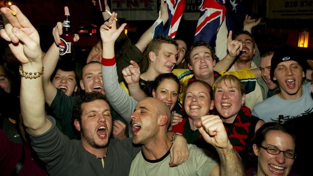 Australian rugby fans celebrate at the Walkabout in 2003.
