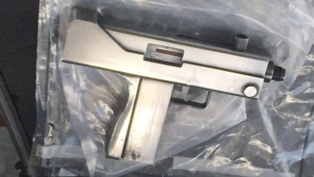 Queensland Police Taskforce Maxima officers and Border Force seized weapons during a raid at Clear Mountain.