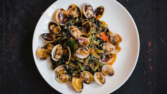 Saffron and squid ink linguine with clams, tomato and basil at Lulu La Delizia.