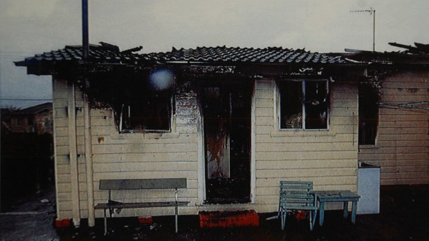 Photo copied from court documents shows the fire damage.