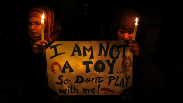 Indians hold a candlelight vigil to mourn the death of a gang rape victim in 2012.