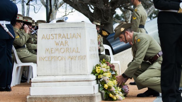 Army chief Lieutenant General Angus Campbell lays a wreath at a ceremony to mark the 70th anniversary of the Victory in the Pacific, or VP Day, at the Australian War Memorial.