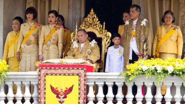 The king is flanked by his family, including Crown Prince Maha Vajiralongkorn (second from right) and Princess Maha Chakri Sirindhorn (first right) in December 2012.