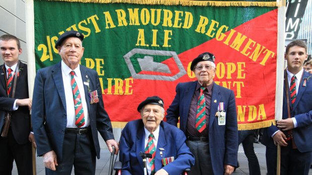 Russ Green, Doug Spinney, and Fred Chivers have donated their regimental banner and, on Monday, marched under it for the last time