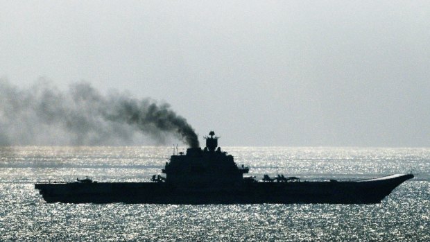 The Russian aircraft carrier Admiral Kuznetsov passes through the Straits of Dover.