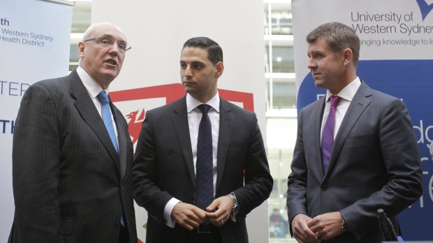 Westward push: University of Western Sydney vice-chancellor Barney Glover, Liverpool mayor Ned Mannoun and Premier Mike Baird in Liverpool on Monday.