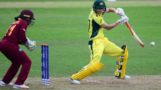 Wrist work: Meg Lanning's dominant technique on show against the West Indies at the World Cup.