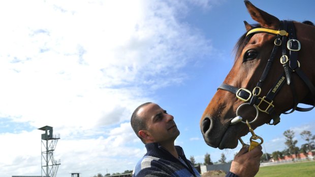 Trainer Saab Hasan with racehorse Shoreham. 