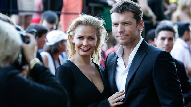Lara Bingle and Sam Worthington arrive at the 3rd Annual AACTA Awards Ceremony at The Star in 2014.