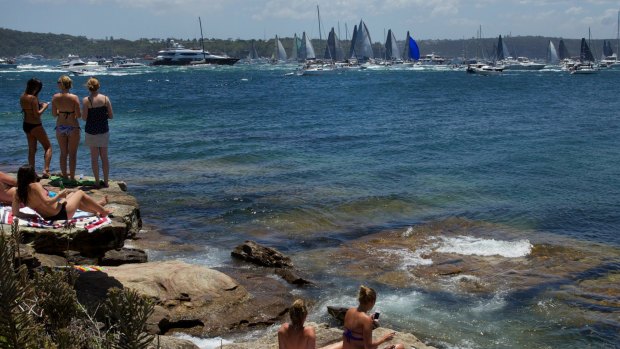 Spectators gather at Watsons Bay to watch the start of the Sydney to Hobart yacht race.