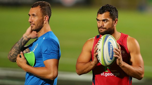 Big two: Quade Cooper with new Reds signing Karmichael Hunt at training.