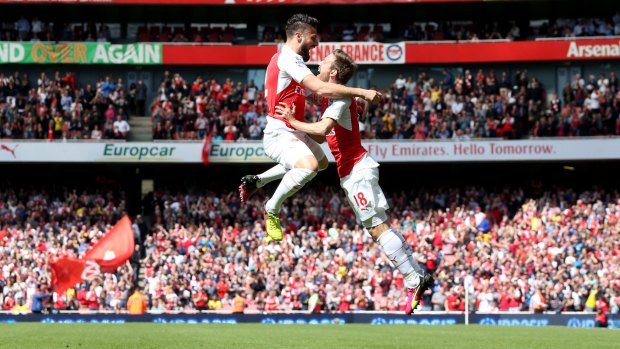 Arsenal's Olivier Giroud and Nacho Monreal celebrate their first goal against Aston Villa at the Emirates.