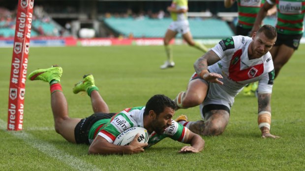 Finding the line: Alex Johnston scores a try against St George Illawarra Dragons.