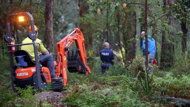 Police search for the remains of Matthew Leveson at Waterfall in the Royal National Park on Saturday.