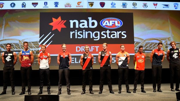 The top 10 draft picks in 2015 lined up at the Adelaide Convention Centre.