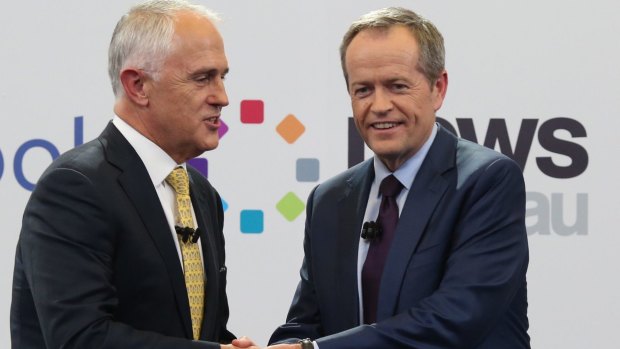 Prime Minister Malcolm Turnbull and Opposition Leader Bill Shorten shake at the Facebook debate.