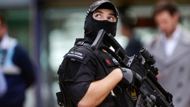 An armed police officer at Manchester Piccadilly railway station in Manchester.