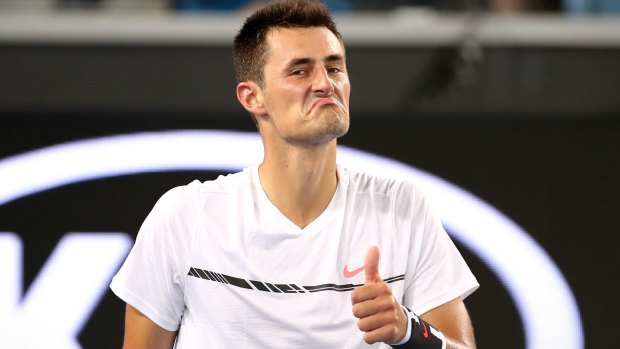 Bernard Tomic gives the thumbs up. 