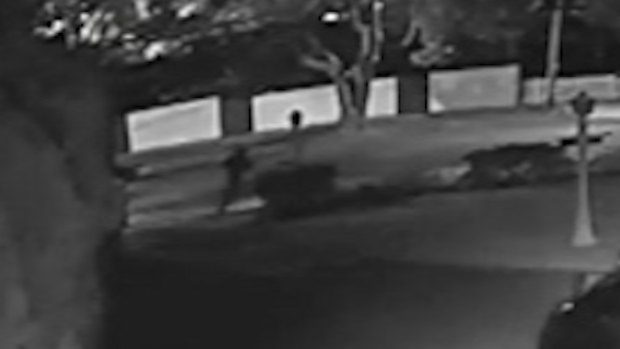 CCTV footage of the man in the hood running away after firing shots.