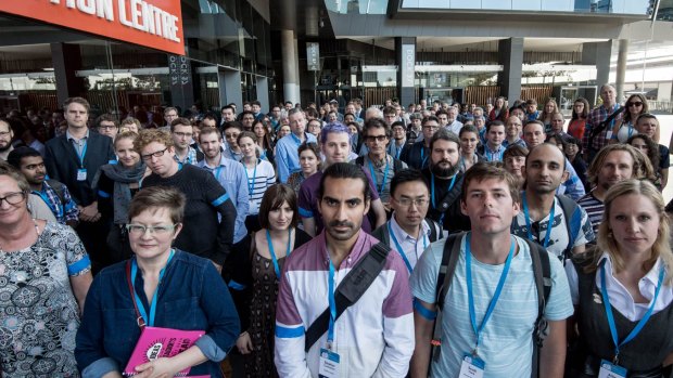Scientists rally in Melbourne against cuts to climate change research at the CSIRO.