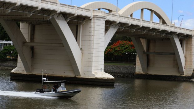 Police continue to search the Brisbane River.