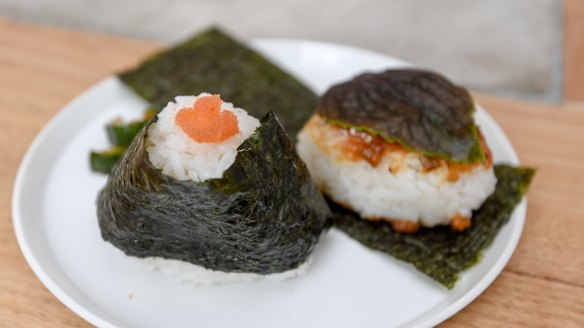 Simple musubi with mentai mayo (cured cod roe and Japanese mayo; left) and shiso leaf covered miso (right).