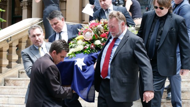 Pallbearers came from the ranks of family members and friends.