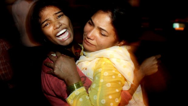 Comfort in a hug following a suicide bomb attack in Lahore. 