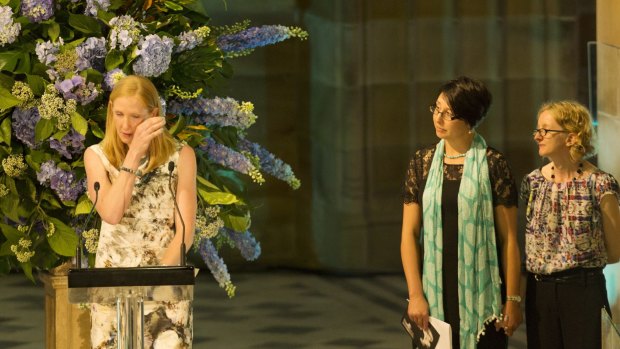 Katrina Dawson's friends: Bridie McDermott is overcome with emotion during the funeral as Sally Webb, centre, and Cate Stewart look on.