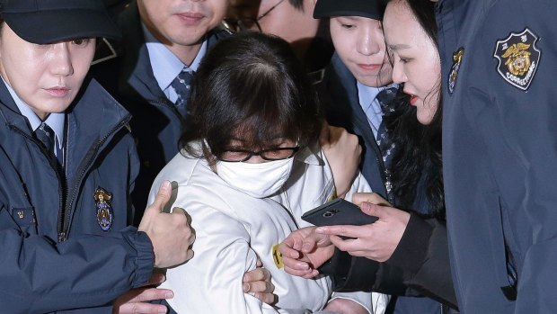 Choi Soon-sil, centre, the jailed confidante of disgraced South Korean President Park Geun-hye, in 2016. 