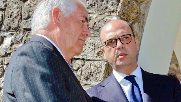 US Secretary of State Rex Tillerson, left, and Italian Foreign Minister Angelino Alfano at a memorial in Santa' Anna di Stazzema, a site of Nazi atrocities where 560 civilians were killed during World War II. 