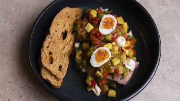Ham hock terrine with mustard pickle and soft quail's egg. 